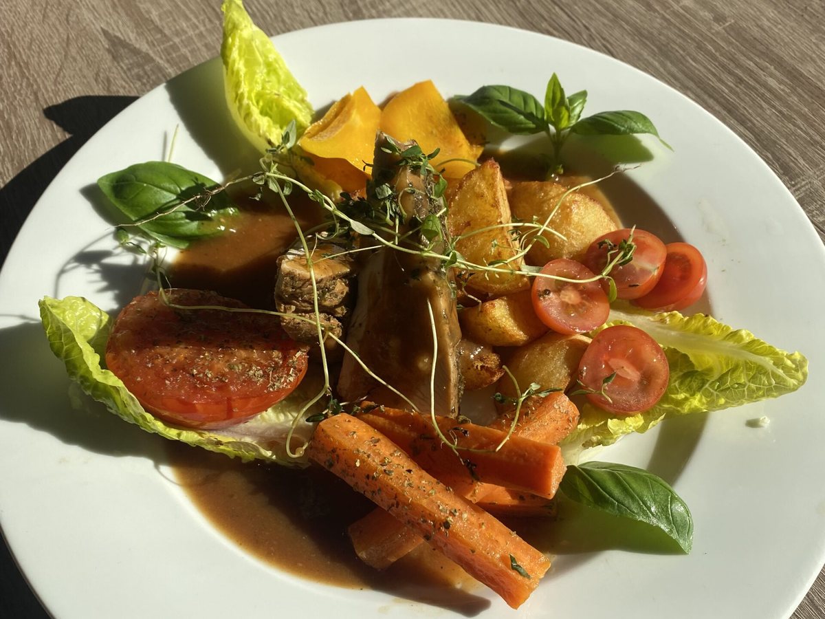 Elegantly plated dish at Polonia